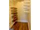 Spacious walk-in closet with shelving, offering organized storage solutions for all your wardrobe needs at 242 12Th St Ne 1 1A, Atlanta, GA 30309