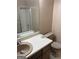 Bathroom showcasing a vanity with single sink, toilet, and bathtub/shower combo at 1288 Lakewood Ne Dr, Conyers, GA 30013