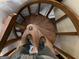 A close up view looking down a spiral staircase at 1288 Lakewood Ne Dr, Conyers, GA 30013