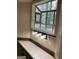 This window view looks out into the yard at 1288 Lakewood Ne Dr, Conyers, GA 30013