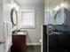 Well lit bathroom featuring stone floors, walk-in shower and vanity at 2341 Elmwood Se Cir, Atlanta, GA 30339