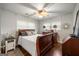 Bedroom featuring hardwood floors, a comfortable bed and a dresser, perfect for relaxation at 2341 Elmwood Se Cir, Atlanta, GA 30339