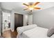 Bedroom featuring hardwood floors, closet space and a bathroom at 2341 Elmwood Se Cir, Atlanta, GA 30339