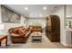 Comfortable living room features leather sofas, neutral carpet, and plenty of room to relax at 2341 Elmwood Se Cir, Atlanta, GA 30339
