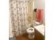 Bathroom features tub shower combo, toilet, and vanity at 122 Lake Ter, Mcdonough, GA 30253
