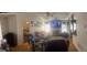 Spacious living room with a fireplace, television, and comfortable seating at 122 Lake Ter, Mcdonough, GA 30253