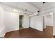 Spacious unfinished basement with white walls/ceiling and dark brown floor at 370 Burton Dr, Douglasville, GA 30134
