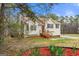 Charming single-story home featuring a welcoming front porch and well-maintained landscaping at 370 Burton Dr, Douglasville, GA 30134