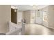 View of the living room that shows neutral walls and new wood flooring at 370 Burton Dr, Douglasville, GA 30134