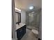 Bathroom features a new vanity and a beautifully tiled shower enclosure at 1433 Butler St, Jonesboro, GA 30236