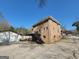 Exterior of home with brick, detached garage and deck at 1433 Butler St, Jonesboro, GA 30236