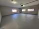 Spacious, freshly painted two-car garage with multiple windows for ample natural light at 1433 Butler St, Jonesboro, GA 30236