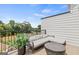 Relaxing outdoor balcony with comfortable seating and a view at 2581 Astaire Ct, Atlanta, GA 30318