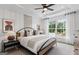 Cozy bedroom with large windows, designer touches, and a comfortable bed at 2581 Astaire Ct, Atlanta, GA 30318