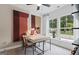 Bright home office features two large windows, neutral walls, and modern decor at 2581 Astaire Ct, Atlanta, GA 30318