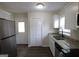 Modern kitchen with stainless steel appliances, granite countertops, and ample cabinet space at 4242 Timber Valley Ct, Decatur, GA 30032