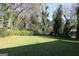 Spacious and verdant backyard with mature trees, offering privacy and plenty of room at 2336 Polar Rock Ave, Atlanta, GA 30315