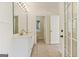 Bright bathroom featuring a double vanity, neutral tiling and an airy feel at 610 Graystone Ct, Peachtree City, GA 30269