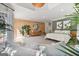 Spacious main bedroom with hardwood accent wall and plenty of natural light at 610 Graystone Ct, Peachtree City, GA 30269