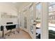 Bright office featuring a modern desk and chair with ample natural light at 610 Graystone Ct, Peachtree City, GA 30269