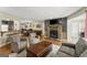 Inviting living space features a fireplace, plush armchairs and view of the dining area at 402 Mill Pond Rd # 402, Roswell, GA 30076