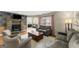 Cozy living room with slate fireplace, plush seating, and natural light at 402 Mill Pond Rd # 402, Roswell, GA 30076