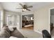 Sunroom with tile floors, glass doors, and a view of the living room at 402 Mill Pond Rd # 402, Roswell, GA 30076