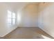 Bedroom featuring neutral carpeting and a large window for natural light at 2536 Lancewood Ln, Lithonia, GA 30058