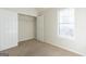Bedroom featuring carpeted flooring, window, and closet at 2536 Lancewood Ln, Lithonia, GA 30058