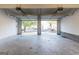 Two car garage showing open doors and view of the neighborhood at 2536 Lancewood Ln, Lithonia, GA 30058