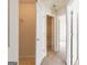 Hallway showing multiple doors to the bathroom and bedrooms at 2536 Lancewood Ln, Lithonia, GA 30058