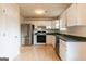 Spacious kitchen with stainless steel appliances, white cabinets, green countertops, and a convenient layout at 2536 Lancewood Ln, Lithonia, GA 30058