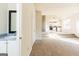 Open-concept living space showcasing a seamless transition to the kitchen area at 2536 Lancewood Ln, Lithonia, GA 30058