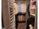 Spacious walk-in closet with organized shelving, hanging rods, and custom storage solutions at 107 Heatherwood Trce, Acworth, GA 30101