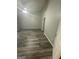 Spacious bedroom featuring new wood look floors and a ceiling fan with overhead lighting at 3731 Patti Pkwy, Decatur, GA 30034