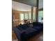 Spacious living area with ample seating and an open layout to the kitchen and dining area at 711 Lily Glen Ln, Stockbridge, GA 30281