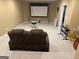 Finished recreation room, perfect for relaxing or watching movies at 711 Lily Glen Ln, Stockbridge, GA 30281