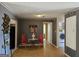 An open concept living area has hardwood floors with easy access to the laundry room and kitchen at 634 S Jeff Davis Dr, Fayetteville, GA 30215