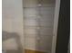 A pantry offers ample storage with multiple wire shelves for easy organization at 634 S Jeff Davis Dr, Fayetteville, GA 30215