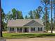 Charming single-story home with a well-manicured lawn and inviting curb appeal at 22638 Salem Church Rd, Metter, GA 30349