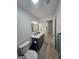 Stylish bathroom featuring modern fixtures, a gray vanity, and a decorative mirror at 5802 Bay Pointe Sound Nw, Acworth, GA 30101