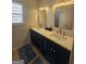 Modern bathroom with double sinks, quartz countertops, and attractive cabinetry at 5802 Bay Pointe Sound Nw, Acworth, GA 30101