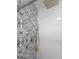 Luxurious shower with mosaic tile walls and floors, as well as a rainfall shower head at 5802 Bay Pointe Sound Nw, Acworth, GA 30101