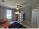 Comfortable bedroom with a unique loft bed and desk combination, plus lots of natural light at 5802 Bay Pointe Sound Nw, Acworth, GA 30101