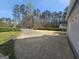 Long driveway and large front yard offering ample parking at 5802 Bay Pointe Sound Nw, Acworth, GA 30101