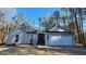 Charming single-story home with a well-manicured front yard and a two-car garage at 5802 Bay Pointe Sound Nw, Acworth, GA 30101