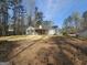 Backyard with screened porch and patio at 5802 Bay Pointe Sound Nw, Acworth, GA 30101