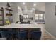 Modern kitchen with a large island, white cabinets, and stainless steel appliances at 5802 Bay Pointe Sound Nw, Acworth, GA 30101
