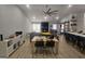 Open-concept living room with vaulted ceilings, fireplace, and seamless flow to the kitchen at 5802 Bay Pointe Sound Nw, Acworth, GA 30101