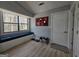 Cozy sitting area features a large window, bench seat, and lots of natural light at 5802 Bay Pointe Sound Nw, Acworth, GA 30101